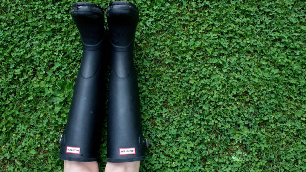 Person wearing a pair of classic Hunter wellies